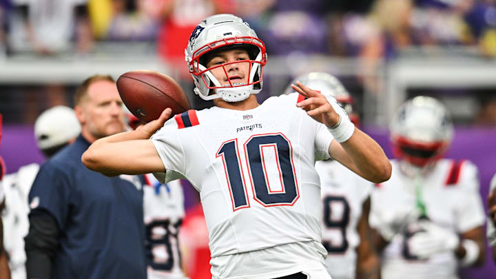 Aug 16, 2025; Minneapolis, Minnesota, USA;  New England Patriots quarterback Drake Maye (10) warms up before the game against the Minnesota Vikings at U.S. Bank Stadium. Mandatory Credit: Jeffrey Becker-Imagn Images