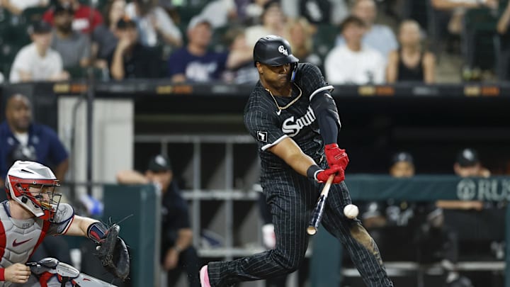Chicago White Sox designated hitter Eloy Jimenez (74) hits an RBI-single against the Minnesota Twins during the sixth inning at Guaranteed Rate Field on July 8.