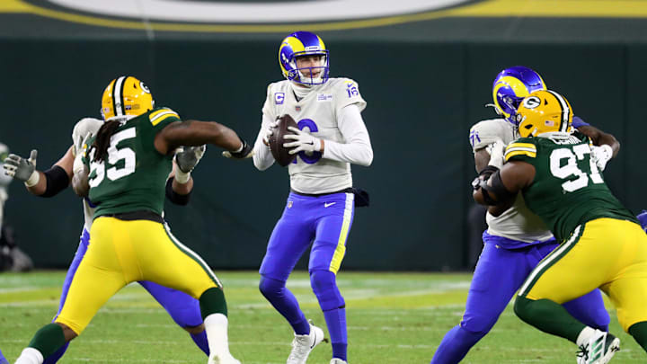 Jan 16, 2021; Green Bay, Wisconsin, USA; Los Angeles Rams quarterback Jared Goff (16) against Green Bay Packers during the NFC Divisional Round at Lambeau Field. Mandatory Credit: Mark J. Rebilas-Imagn Images