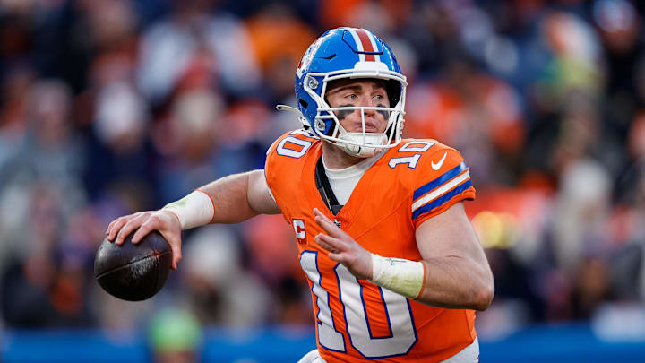 Denver Broncos quarterback Bo Nix looks to pass in the third quarter against the Kansas City Chiefs at Empower Field at Mile High. Mandatory Credit: Isaiah J. Downing-Imagn Images