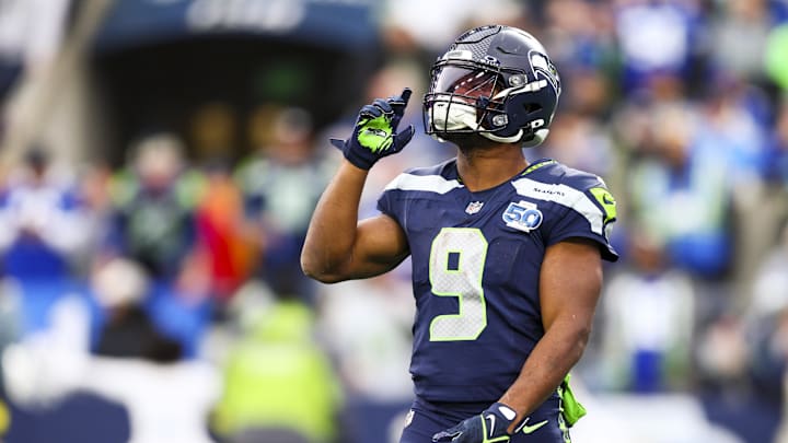 Dec 14, 2025; Seattle, Washington, USA; Seattle Seahawks running back Kenneth Walker III (9) reacts to a play against the Indianapolis Colts during the third quarter at Lumen Field. Mandatory Credit: Kevin Ng-Imagn Images