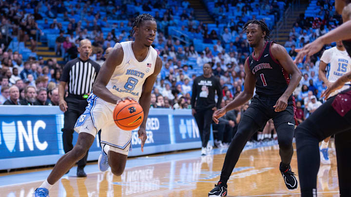 Nov 14, 2025; Chapel Hill, North Carolina, USA; North Carolina Tar Heels forward Caleb Wilson (8) drives with the ball during the second half against the North Carolina Central Eagles at Dean E. Smith Center. 