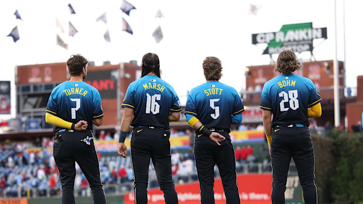 Apr 4, 2025; Philadelphia, Pennsylvania, USA; Philadelphia Phillies shortstop Trea Turner (7) and outfielder Brandon Marsh (16) and second base Bryson Stott (5) and third base Alec Bohm (28) before action against the Los Angeles Dodgers at Citizens Bank Park. Mandatory Credit: Bill Streicher-Imagn Images