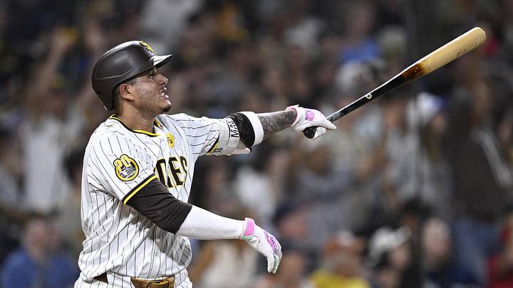 Aug 20, 2024; San Diego, California, USA; San Diego Padres third baseman Manny Machado (13) hits a two-run home run against the Minnesota Twins during the seventh inning at Petco Park. Mandatory Credit: Orlando Ramirez-USA TODAY Sports Aug 20, 2024; San Diego, California, USA; San Diego Padres third baseman Manny Machado (13) hits a two-run home run against the Minnesota Twins during the seventh inning at Petco Park. Mandatory Credit: Orlando Ramirez-USA TODAY Sports
