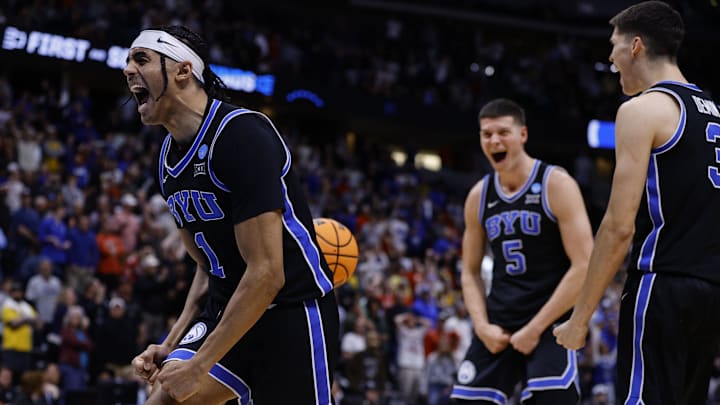 Mar 22, 2025; Denver, CO, USA; Brigham Young Cougars guard Trey Stewart (1) reacts after defeating the Wisconsin Badgers in the second round of the NCAA Tournament  at Ball Arena. Mandatory Credit: Isaiah J. Downing-Imagn Images