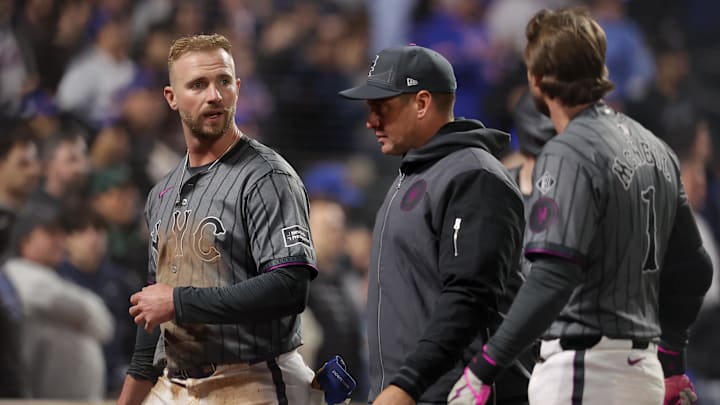May 1, 2024; New York City, New York, USA; New York Mets first baseman Pete Alonso (20) reacts with manager Carlos Mendoza (64) after being tagged out at home to end the game while trying to score on a fly ball by second baseman Jeff McNeil (not pictured) during the ninth inning against the Chicago Cubs at Citi Field. The play was upheld after a video replay. Mandatory Credit: Brad Penner-USA TODAY Sports