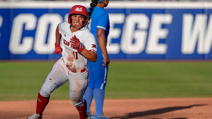 Texas Tech infielder Lauren Allred (11) round second base to third in the fifth inning during a softball game between Texas Tech and UCLA at the Women’s College World Series at Devon Park in Oklahoma City, on Saturday, May 31, 2025.