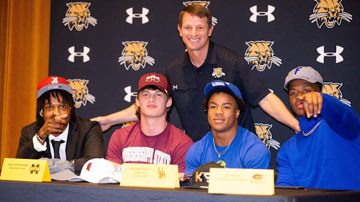 Florida Gators' signee Gavin Hill (far right) signs with the Florida Gators alongside high school teammates Jaren Hamilton (Alabama), Creed Whittemore (Mississippi State), Ja'Carree Kelly (Delaware) and Buchholz head coach Mark Whittemore. Florida Gators' signee Gavin Hill (far right) signs with the Florida Gators alongside high school teammates Jaren Hamilton (Alabama), Creed Whittemore (Mississippi State), Ja'Carree Kelly (Delaware) and Buchholz head coach Mark Whittemore.