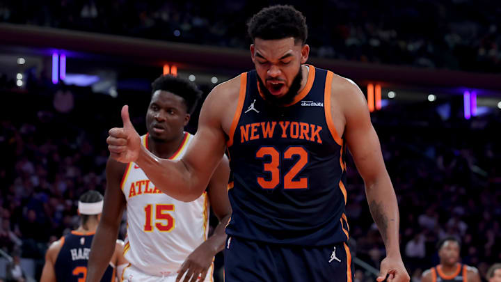 Dec 11, 2024; New York, New York, USA; New York Knicks center Karl-Anthony Towns (32) reacts during the second quarter against the Atlanta Hawks at Madison Square Garden. Mandatory Credit: Brad Penner-Imagn Images