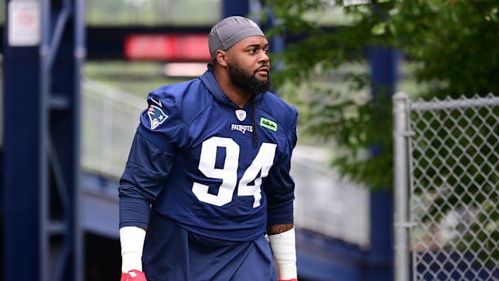 Jul 24, 2024; Foxborough, MA, USA; New England Patriots defensive tackle Armon Watts (94) walks to the practice field during training camp at Gillette Stadium. Jul 24, 2024; Foxborough, MA, USA; New England Patriots defensive tackle Armon Watts (94) walks to the practice field during training camp at Gillette Stadium.