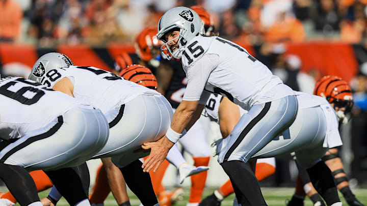Nov 3, 2024; Cincinnati, Ohio, USA; Las Vegas Raiders quarterback Gardner Minshew (15) snaps the ball against the Cincinnati Bengals in the first half at Paycor Stadium. Mandatory Credit: Katie Stratman-Imagn Images