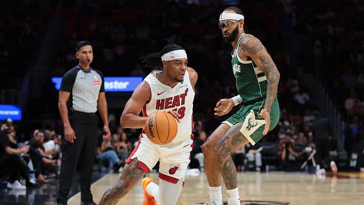 Oct 6, 2025; Miami, Florida, USA; Miami Heat guard Trevor Keels (18) drives to the basket against Milwaukee Bucks guard Gary Trent Jr. (5) during the second quarter at Kaseya Center. Mandatory Credit: Sam Navarro-Imagn Images Oct 6, 2025; Miami, Florida, USA; Miami Heat guard Trevor Keels (18) drives to the basket against Milwaukee Bucks guard Gary Trent Jr. (5) during the second quarter at Kaseya Center. Mandatory Credit: Sam Navarro-Imagn Images