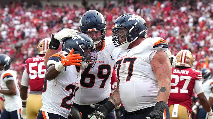 Oct 4, 2026; Santa Clara, California, USA; Denver Broncos running back Tyler Badie (left) celebrates with offensive tackle Mike McGlinchey (69) and guard Quinn Meinerz (77) after scoring on a two-point conversion against the San Francisco 49ers during the fourth quarter at Levi's Stadium. Mandatory Credit: Darren Yamashita-Imagn Images
