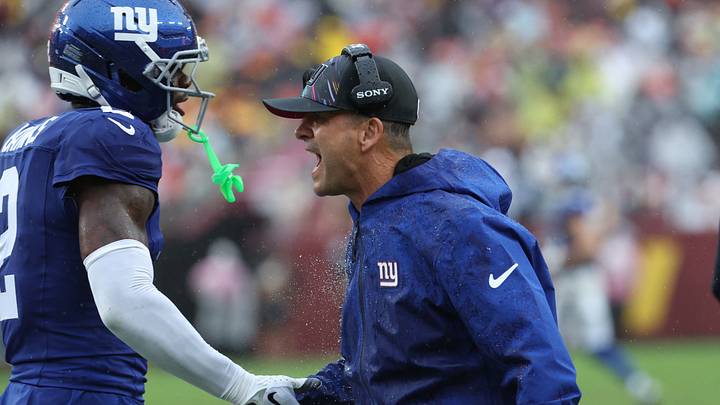 Oct 11, 2026; Landover, Maryland, USA; New York Giants head coach John Harbaugh shakes hands with cornerback Deonte Banks (2) after the second quarter against the Washington Commanders at Northwest Stadium. Oct 11, 2026; Landover, Maryland, USA; New York Giants head coach John Harbaugh shakes hands with cornerback Deonte Banks (2) after the second quarter against the Washington Commanders at Northwest Stadium.
