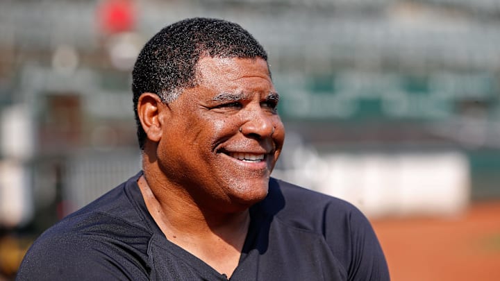 Aug 28, 2021; Oakland, California, USA; New York Yankees bullpen coach Mike Harkey (60) is interviewed on the field before the game against the Oakland Athletics at RingCentral Coliseum. Mandatory Credit: Darren Yamashita-Imagn Images