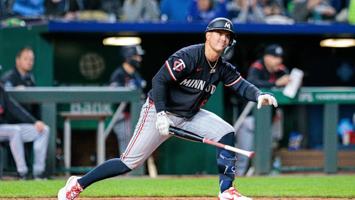 Apr 8, 2025; Kansas City, Missouri, USA; Minnesota Twins third base Jose Miranda (64) reacts after a strike out during the fifth inning against the Kansas City Royals at Kauffman Stadium. Mandatory Credit: William Purnell-Imagn Images