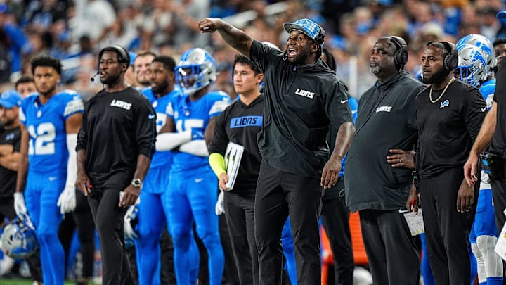 Detroit Lions linebackers coach Kelvin Sheppard signals players before a play against Los Angeles Rams during the second half at Ford Field in Detroit on Sunday, September 8, 2024.