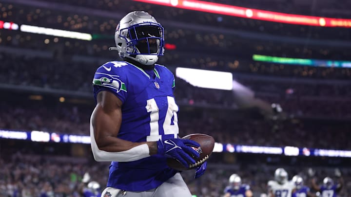 Nov 30, 2023; Arlington, Texas, USA; Seattle Seahawks wide receiver DK Metcalf (14) catches a pass for a touchdown during the second half against the Dallas Cowboys at AT&T Stadium. Mandatory Credit: Tim Heitman-Imagn Images