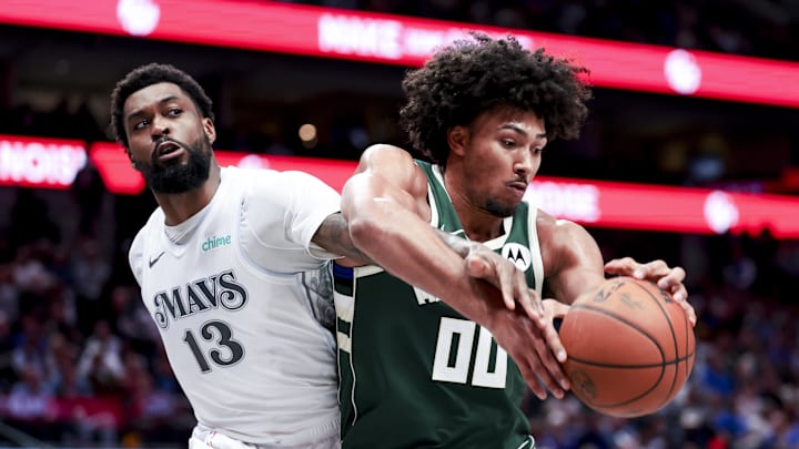 Mar 1, 2025; Dallas, Texas, USA; Milwaukee Bucks center Jericho Sims (00) and Dallas Mavericks forward Naji Marshall (13) battle for the ball during the second half at American Airlines Center. Mandatory Credit: Kevin Jairaj-Imagn Images Mar 1, 2025; Dallas, Texas, USA; Milwaukee Bucks center Jericho Sims (00) and Dallas Mavericks forward Naji Marshall (13) battle for the ball during the second half at American Airlines Center. Mandatory Credit: Kevin Jairaj-Imagn Images