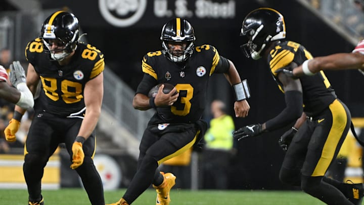 Oct 28, 2024; Pittsburgh, Pennsylvania, USA; Pittsburgh Steelers quarterback Russell Wilson (3) scrambles against  the New York Giants during the fourth quarter at Acrisure Stadium. Mandatory Credit: Barry Reeger-Imagn Images