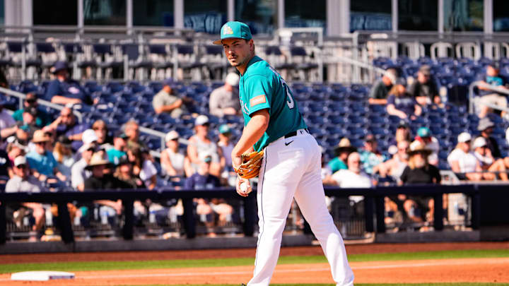 Feb 24, 2026; Peoria, Arizona, USA; Seattle Mariners pitcher Michael Rucker (38) looks toward first during the third inning against the Chicago White Sox in Peoria, Arizona. Mandatory Credit: Arianna Grainey-Imagn Images Feb 24, 2026; Peoria, Arizona, USA; Seattle Mariners pitcher Michael Rucker (38) looks toward first during the third inning against the Chicago White Sox in Peoria, Arizona. Mandatory Credit: Arianna Grainey-Imagn Images