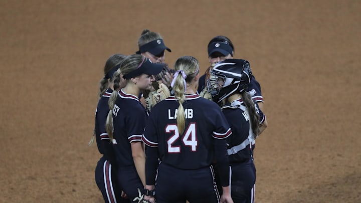 May 8, 2025; Athens, GA, USA; South Carolina teammates meet on the mound during a game against Texas A&M at Jack Turner Stadium. Mandatory Credit: Mady Mertens-Imagn Images
