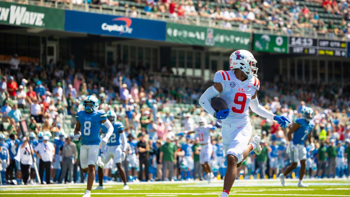 Sep 9, 2023; New Orleans, Louisiana, USA; Mississippi Rebels wide receiver Tre Harris (9) catches a pass for a touchdown against the Tulane Green Wave during the first half at Yulman Stadium. Mandatory Credit: Stephen Lew-USA TODAY Sports Sep 9, 2023; New Orleans, Louisiana, USA; Mississippi Rebels wide receiver Tre Harris (9) catches a pass for a touchdown against the Tulane Green Wave during the first half at Yulman Stadium. Mandatory Credit: Stephen Lew-USA TODAY Sports