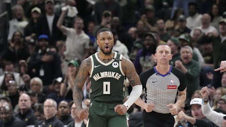 Apr 25, 2025; Milwaukee, Wisconsin, USA; Milwaukee Bucks guard Damian Lillard (0) reacts after making a basket against the Indiana Pacers in the second half during game three of first round for the 2024 NBA Playoffs at Fiserv Forum. Mandatory Credit: Michael McLoone-Imagn Images Apr 25, 2025; Milwaukee, Wisconsin, USA; Milwaukee Bucks guard Damian Lillard (0) reacts after making a basket against the Indiana Pacers in the second half during game three of first round for the 2024 NBA Playoffs at Fiserv Forum. Mandatory Credit: Michael McLoone-Imagn Images