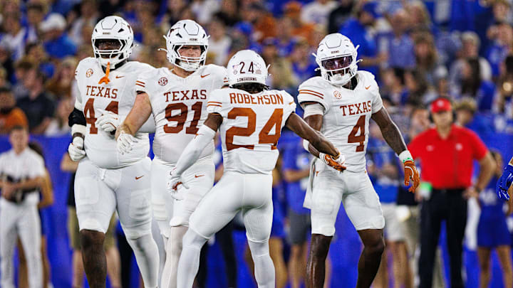 Texas Longhorns defensive back Warren Roberson (24) high fives defensive back Jelani McDonald (4) during the second quarter, Oct. 18, 2025 at Kroger Field in Lexington, Kentucky. Texas Longhorns defensive back Warren Roberson (24) high fives defensive back Jelani McDonald (4) during the second quarter, Oct. 18, 2025 at Kroger Field in Lexington, Kentucky.