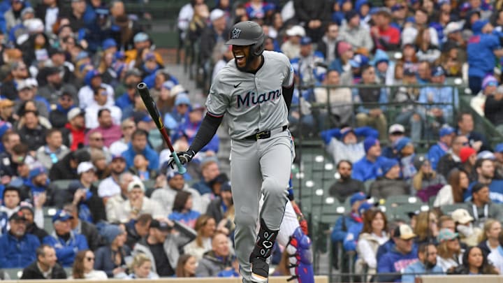 Miami Marlins outfielder Bryan De La Cruz flips his bat after hitting the go-ahead homer in the 9th inning of Saturday's game one against the Chicago Cubs. Miami Marlins outfielder Bryan De La Cruz flips his bat after hitting the go-ahead homer in the 9th inning of Saturday's game one against the Chicago Cubs.