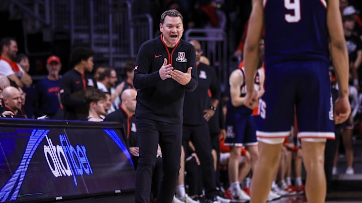 Jan 4, 2025; Cincinnati, Ohio, USA; Arizona Wildcats head coach Tommy Lloyd reacts after a play against the Cincinnati Bearcats in the second half at Fifth Third Arena. Mandatory Credit: Katie Stratman-Imagn Images