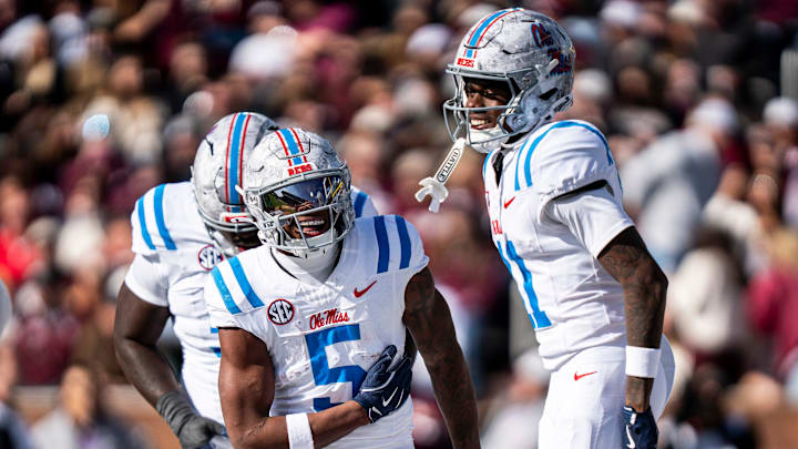 Ole Miss running back Kewan Lacy (5) celebrates with Ole Miss wide receiver Deuce Alexander (11) after scoring a touchdown during a college football game between Mississippi State and Ole Miss at Davis Wade Stadium in Starkville, Miss., on Friday, Nov. 28, 2025. The Egg Bowl game marks the 122nd meeting between the two teams.