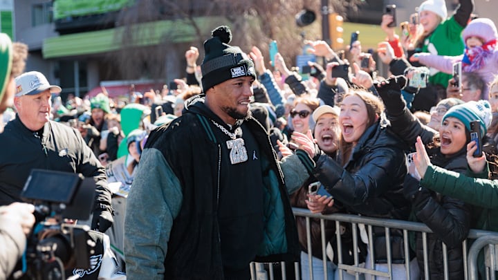 Feb 14, 2025; Philadelphia, PA, USA; Philadelphia Eagles running back Saquon Barkley (26) celebrates during the Super Bowl LIX championship parade and rally. Mandatory Credit: Caean Couto-Imagn Images