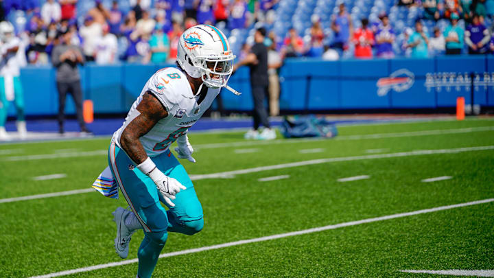 Safety Jevon Holland (8) warms up before the game against the Buffalo Bills at Highmark Stadium. Safety Jevon Holland (8) warms up before the game against the Buffalo Bills at Highmark Stadium.