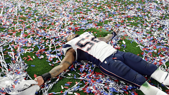 Feb 1, 2015; Glendale, AZ, USA; New England Patriots outside linebacker Jonathan Casillas (52) celebrates after beating the Seattle Seahawks in Super Bowl XLIX at University of Phoenix Stadium. Mandatory Credit: Matthew Emmons-Imagn Images