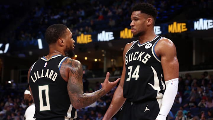 Feb 15, 2024; Memphis, Tennessee, USA; Milwaukee Bucks guard Damian Lillard (0) talks with forward Giannis Antetokounmpo (34) during a time out during the first half against the Memphis Grizzlies at FedExForum. Mandatory Credit: Petre Thomas-Imagn Images Feb 15, 2024; Memphis, Tennessee, USA; Milwaukee Bucks guard Damian Lillard (0) talks with forward Giannis Antetokounmpo (34) during a time out during the first half against the Memphis Grizzlies at FedExForum. Mandatory Credit: Petre Thomas-Imagn Images