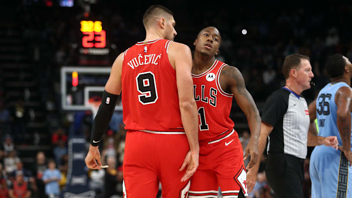 Oct 28, 2024; Memphis, Tennessee, USA; Chicago Bulls center Nikola Vucevic (9) reacts with guard Ayo Dosunmu (11) during the second half against the Memphis Grizzlies at FedExForum. Mandatory Credit: Petre Thomas-Imagn Images