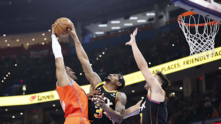 Mar 29, 2024; Oklahoma City, Oklahoma, USA; Oklahoma City Thunder forward Jalen Williams (8) has a shot blocked by Phoenix Suns guard Bradley Beal (3) during the second half at Paycom Center. Mandatory Credit: Alonzo Adams-Imagn Images