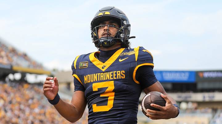 Sep 12, 2026; Morgantown, West Virginia, USA;  West Virginia Mountaineers quarterback Michael Hawkins Jr. (3) runs the ball for a touchdown during the second quarter against the UT Martin Skyhawks at Milan Puskar Stadium.  Mandatory Credit: Ben Queen-Imagn Images