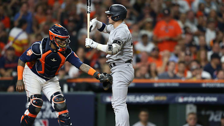 New York Yankees third baseman Josh Donaldson (right) strikes out.