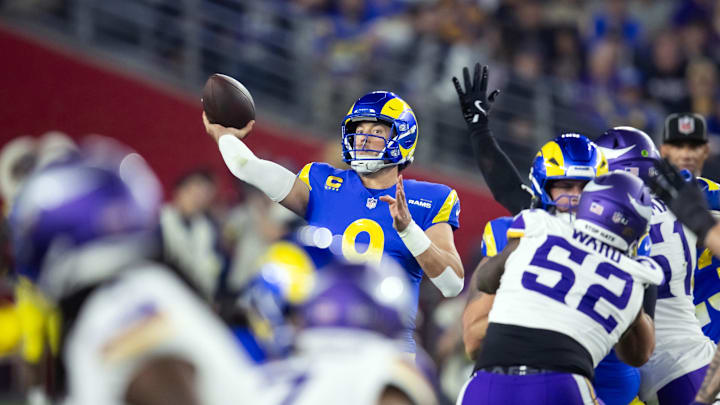 Jan 13, 2025; Glendale, AZ, USA; Los Angeles Rams quarterback Matthew Stafford (9) against the Minnesota Vikings during an NFC wild card game at State Farm Stadium. Mandatory Credit: Mark J. Rebilas-Imagn Images