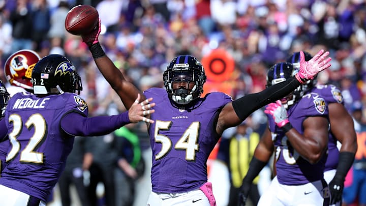 Oct 9, 2016; Baltimore, MD, USA;  Baltimore Ravens linebacker Zachary Orr (54) celebrates his fumble recovery against the Washington Redskins at M&T Bank Stadium. Mandatory Credit: Mitch Stringer-Imagn Images