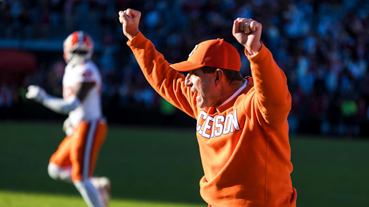 Nov 29, 2025; Columbia, South Carolina, USA; Clemson Tigers head coach Dabo Swinney celebrates a play against the South Carolina Gamecocks in the fourth quarter at Williams-Brice Stadium. Mandatory Credit: Jeff Blake-Imagn Images Nov 29, 2025; Columbia, South Carolina, USA; Clemson Tigers head coach Dabo Swinney celebrates a play against the South Carolina Gamecocks in the fourth quarter at Williams-Brice Stadium. Mandatory Credit: Jeff Blake-Imagn Images