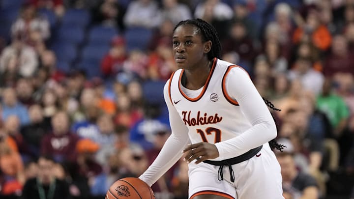 Mar 9, 2024; Greensboro, NC, USA; Virginia Tech Hokies guard Samyha Suffren (12) brings the ball up court in the first half against the Notre Dame Fighting Irish at Greensboro Coliseum. Mandatory Credit: David Yeazell-Imagn Images