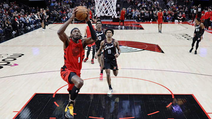 Feb 8, 2024; Portland, Oregon, USA; Portland Trail Blazers small forward Jerami Grant (9) goes up for a dunk during the first half against the Detroit Pistons at Moda Center. Mandatory Credit: Soobum Im-Imagn Images