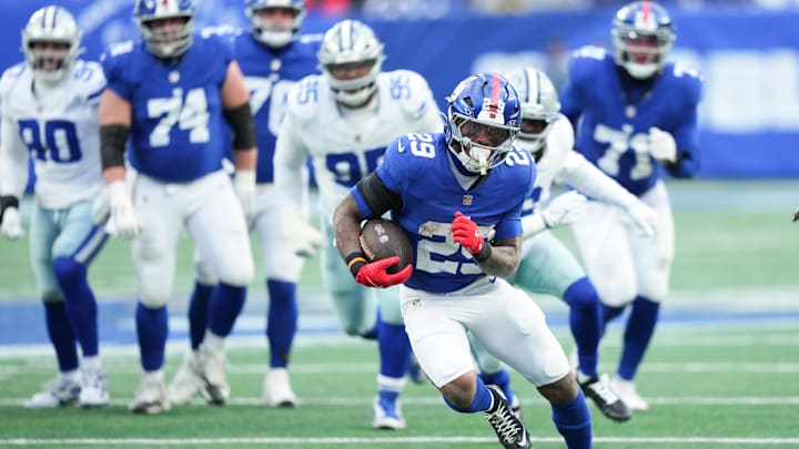 Jan 4, 2026; East Rutherford, New Jersey, USA; New York Giants running back Tyrone Tracy Jr. (29) rushes during the fourth quarter against the Dallas Cowboys at MetLife Stadium. Jan 4, 2026; East Rutherford, New Jersey, USA; New York Giants running back Tyrone Tracy Jr. (29) rushes during the fourth quarter against the Dallas Cowboys at MetLife Stadium.