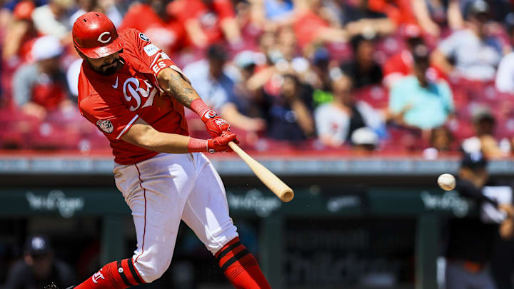 Jun 19, 2025; Cincinnati, Ohio, USA; Cincinnati Reds first baseman Christian Encarnacion-Strand (33) hits a single in the eighth inning against the Minnesota Twins at Great American Ball Park. Mandatory Credit: Katie Stratman-Imagn Images