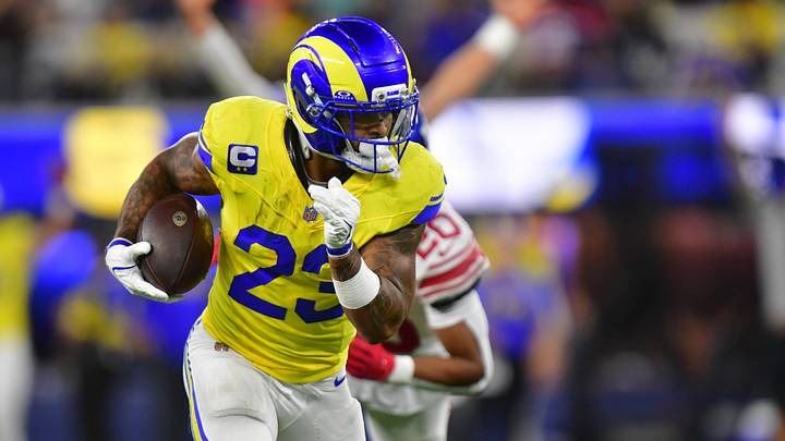 Los Angeles Rams running back Kyren Williams (23) runs against New York Giants cornerback Greg Newsome II (20) during the third quarter at SoFi Stadium. Los Angeles Rams running back Kyren Williams (23) runs against New York Giants cornerback Greg Newsome II (20) during the third quarter at SoFi Stadium.