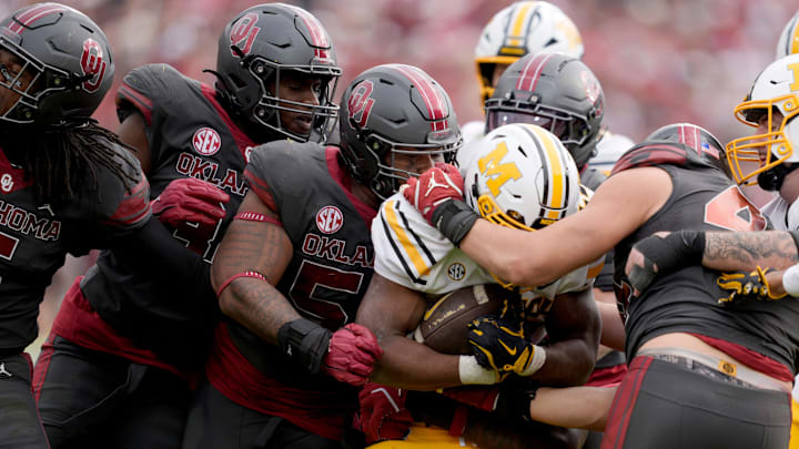 Missouri Tigers running back Ahmad Hardy (29) is brought down during a college football game between the University of Oklahoma Sooners (OU) and the Missouri Tigers at Gaylord Family Ð Oklahoma Memorial Stadium in Norman, Okla., on Saturday. Oklahoma won 17-6. Missouri Tigers running back Ahmad Hardy (29) is brought down during a college football game between the University of Oklahoma Sooners (OU) and the Missouri Tigers at Gaylord Family Ð Oklahoma Memorial Stadium in Norman, Okla., on Saturday. Oklahoma won 17-6.