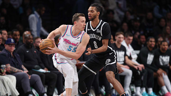 Feb 7, 2025; Brooklyn, New York, USA; Miami Heat forward Duncan Robinson (55) is guarded by Brooklyn Nets forward Ziaire Williams (8) during the first half at Barclays Center. Mandatory Credit: Vincent Carchietta-Imagn Images Feb 7, 2025; Brooklyn, New York, USA; Miami Heat forward Duncan Robinson (55) is guarded by Brooklyn Nets forward Ziaire Williams (8) during the first half at Barclays Center. Mandatory Credit: Vincent Carchietta-Imagn Images